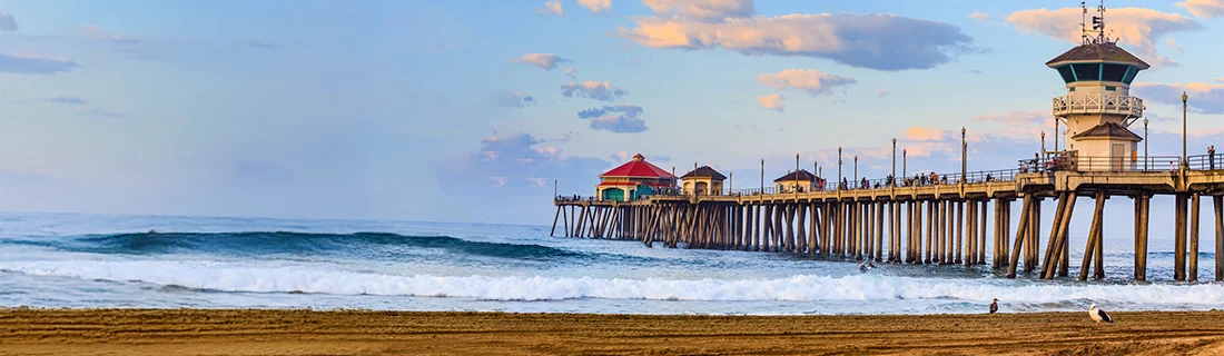 Dentist San Jose CA Waves On The Beach With A Pier In The Background